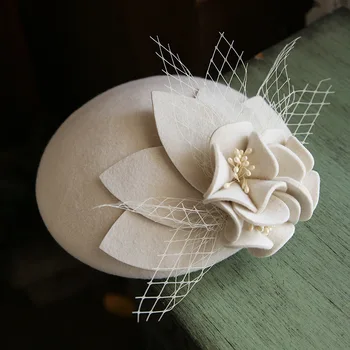 Жена мрежест цилиндър, в есенно-зимната нова вълнена шапка, елегантна и модна шапка